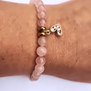 Pulsera de cuarzo rosado con dije corazón